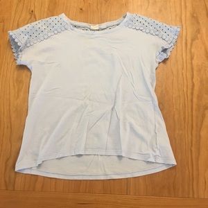 Cute baby blue t-shirt w embroidery on shoulders.